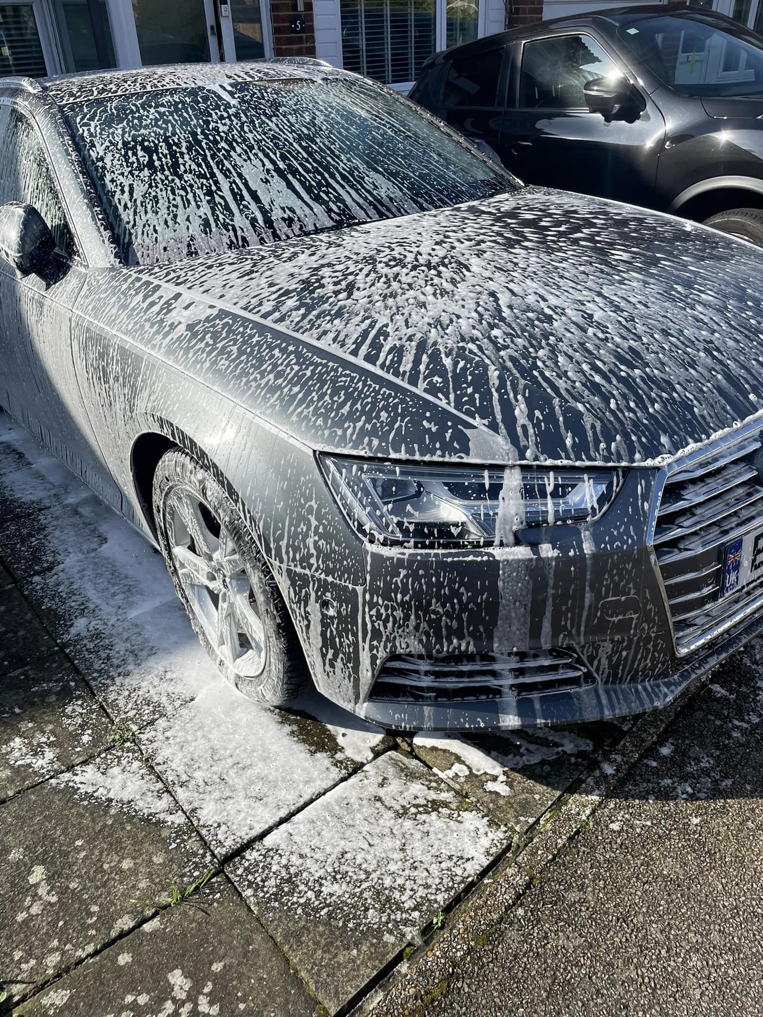 Snow foam working on a car