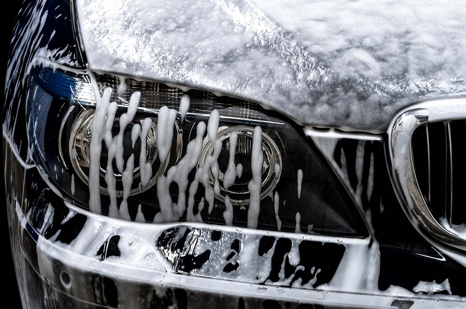 Close up of washing a car